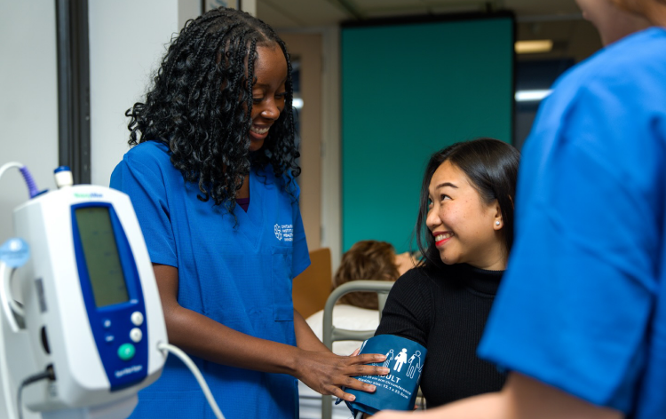 Nurse taking blood pressure